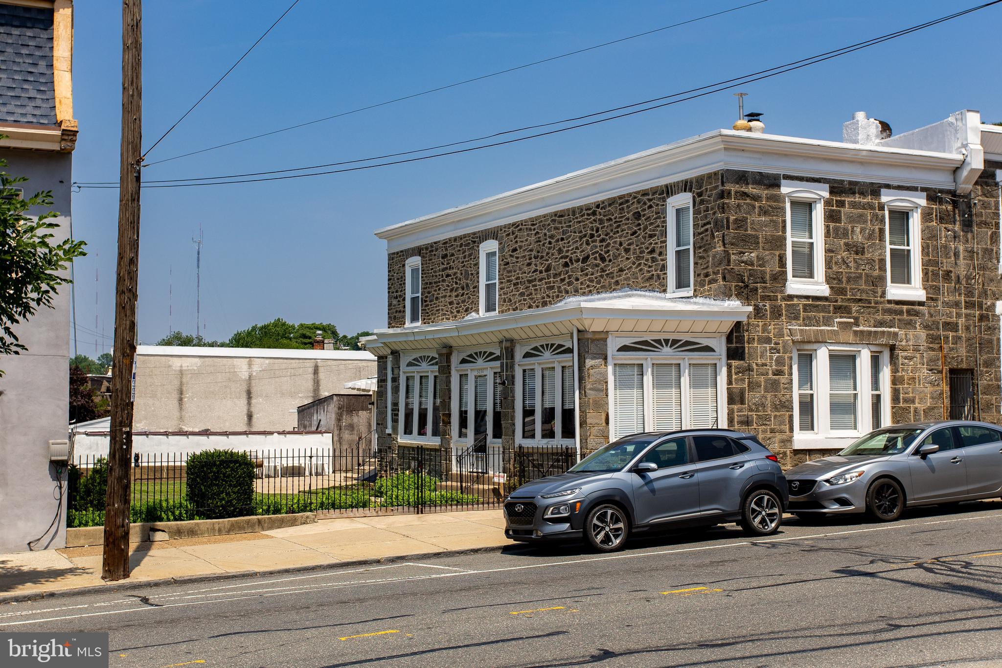 5236 Ridge Avenue Philadelphia, PA 19128 - Photo 2 of 45 a car parked in front of a house