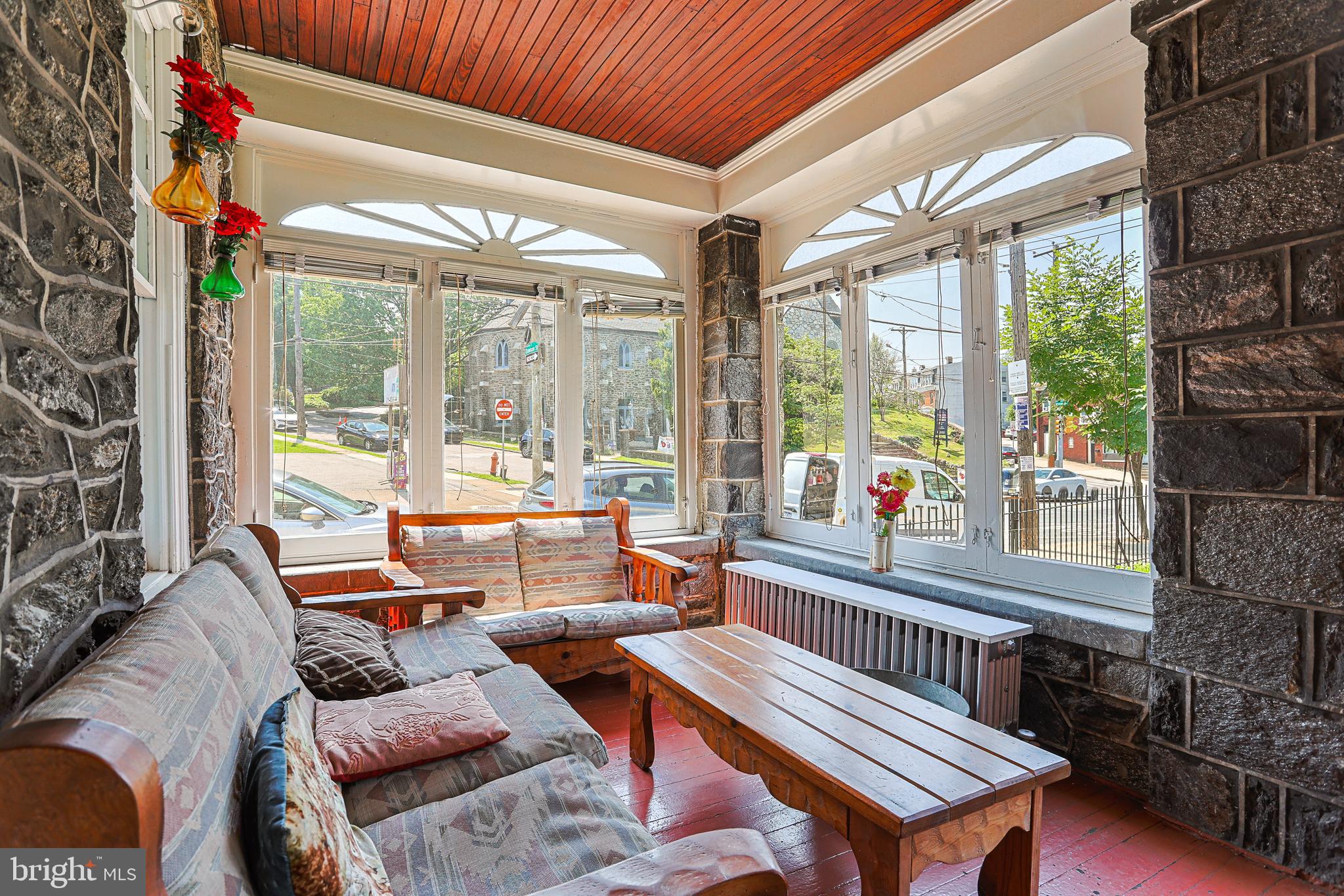 5236 Ridge Avenue Philadelphia, PA 19128 - Photo 21 of 45 a living room with patio furniture and a potted plants
