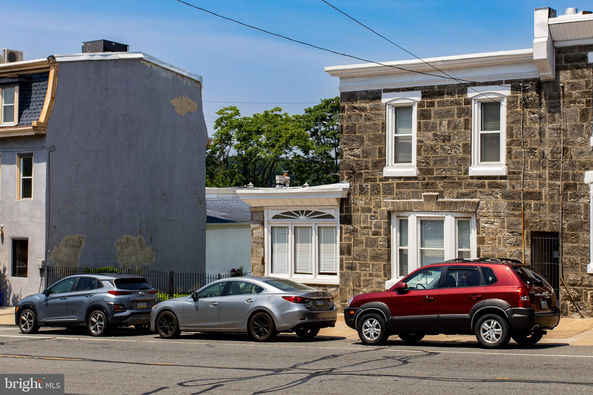 5236 Ridge Avenue Philadelphia, PA 19128 - Photo 3 of 45 a view of a car parked in front of a house