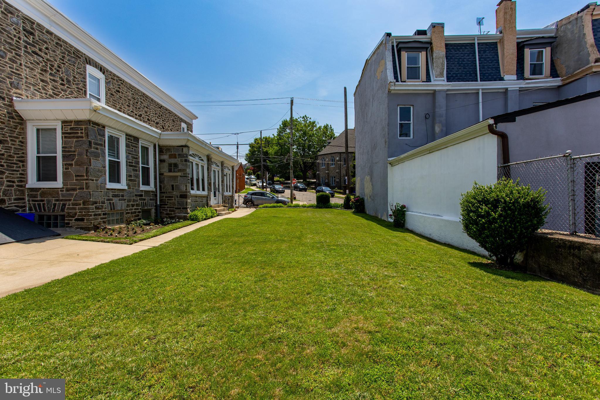 5236 Ridge Avenue Philadelphia, PA 19128 - Photo 44 of 45 a view of a house with a yard and sitting area