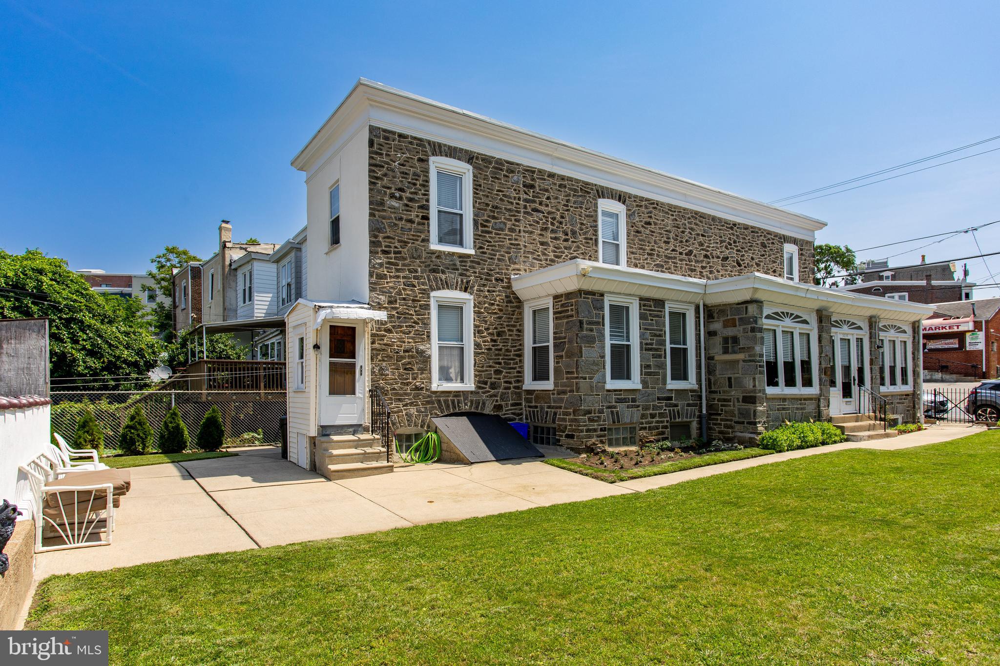 5236 Ridge Avenue Philadelphia, PA 19128 - Photo 6 of 45 a view of a house with a yard and sitting area