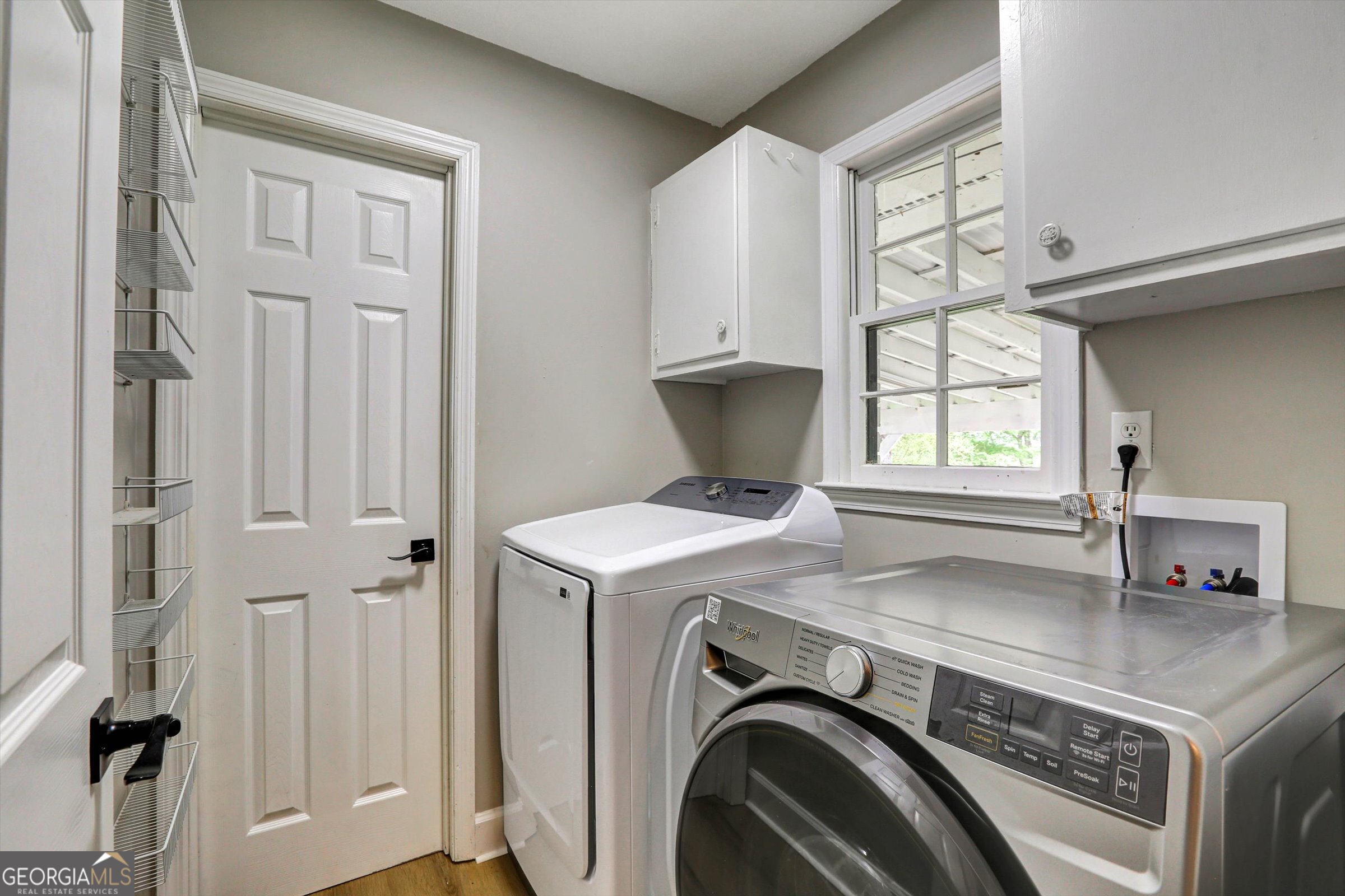 1095 Athens Road Winterville, GA 30683 - Photo 25 of 32 a utility room with dryer and washer