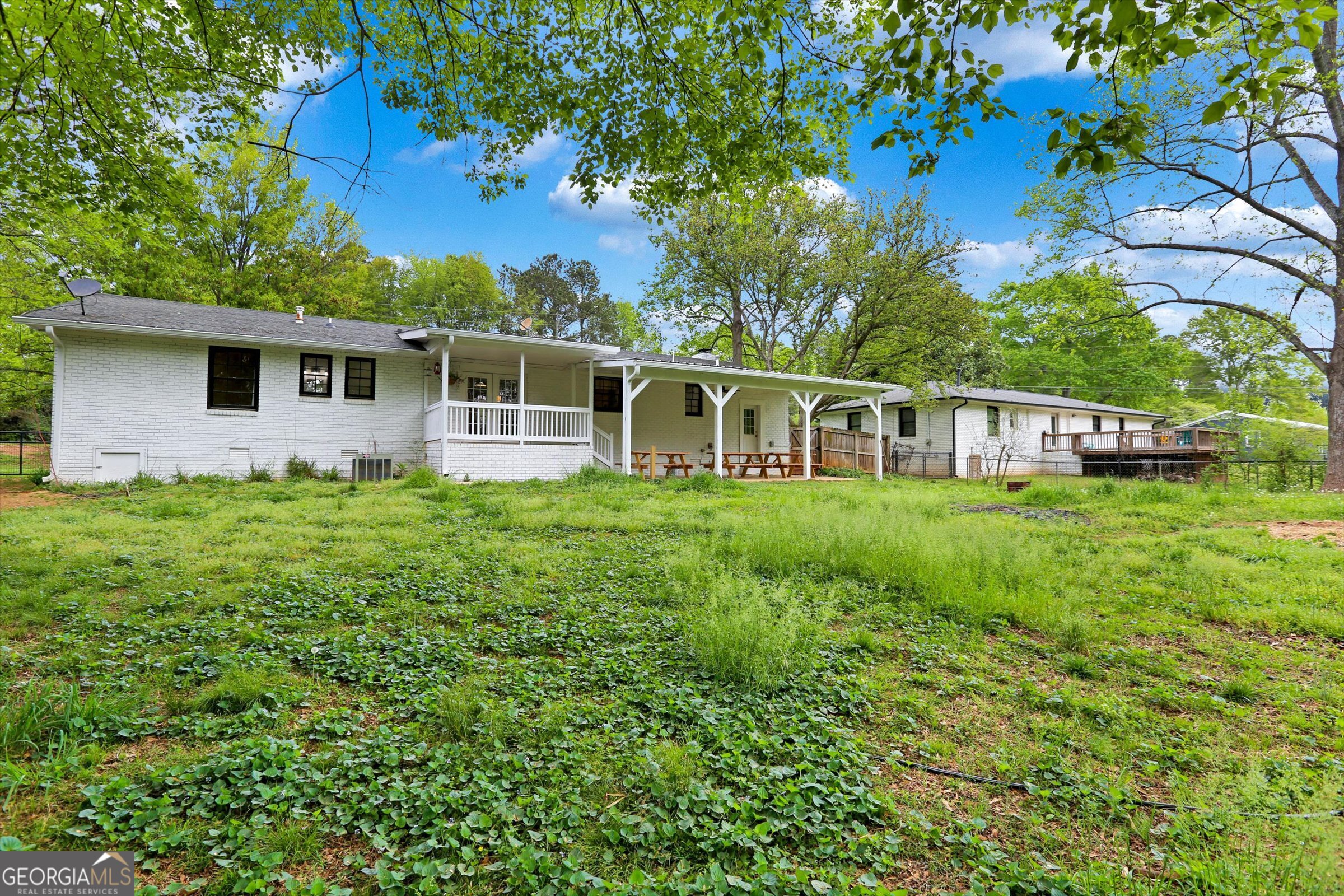 1095 Athens Road Winterville, GA 30683 - Photo 32 of 32 a house view with a garden space