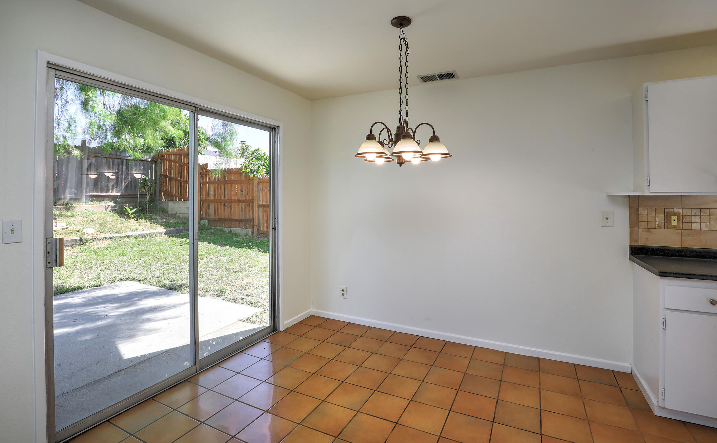 5058 Rocoso Way Santa Barbara, CA 93111 - Photo 4 of 19 a view of an empty room with windows