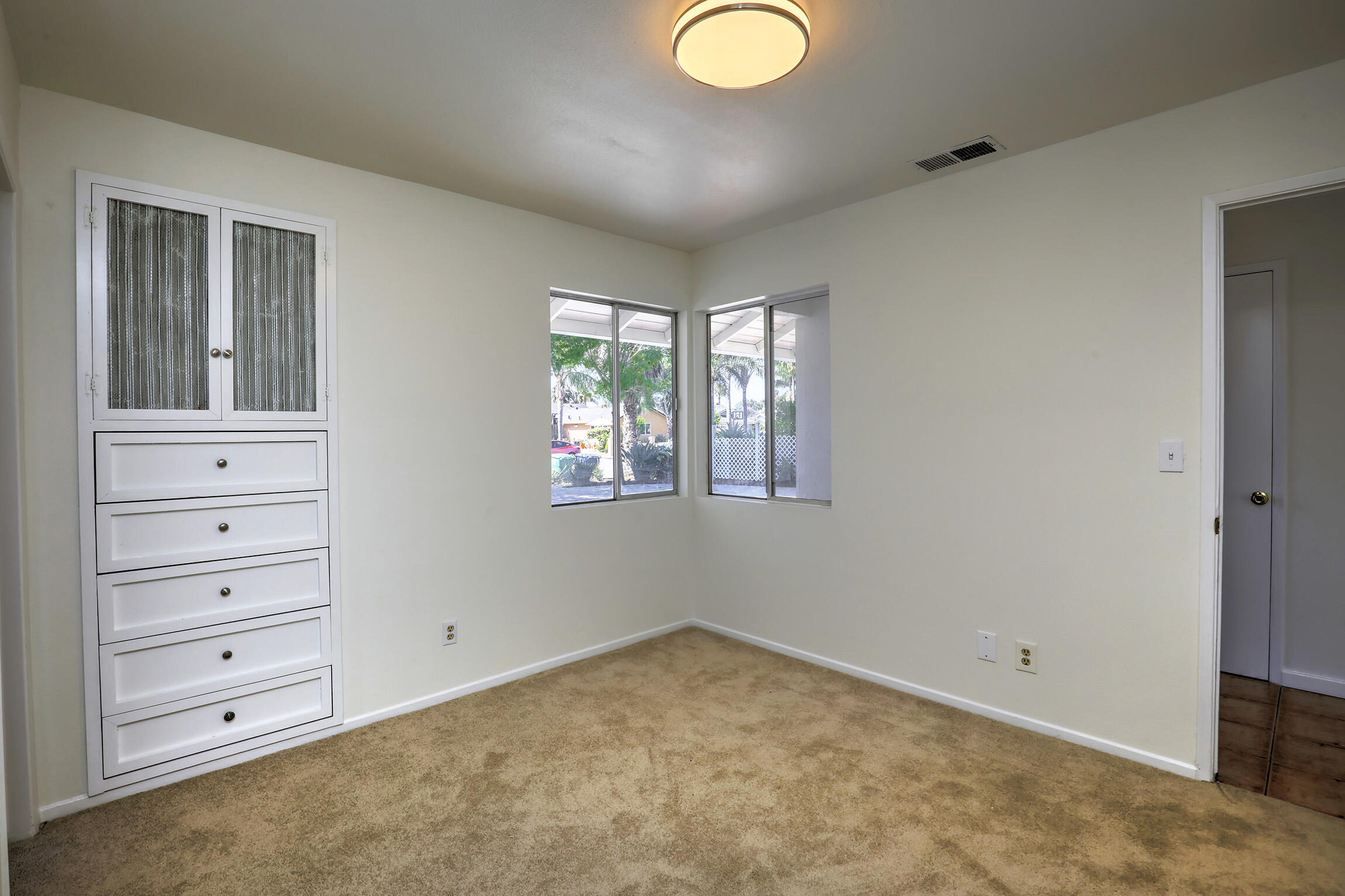 5058 Rocoso Way Santa Barbara, CA 93111 - Photo 8 of 19 wooden floor and window in a room