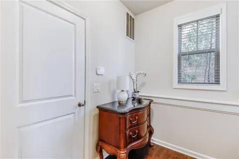 a room with storage and window