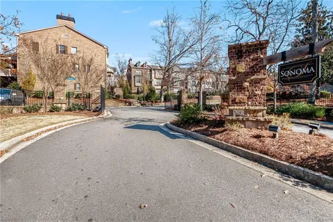 a view of a street with cars