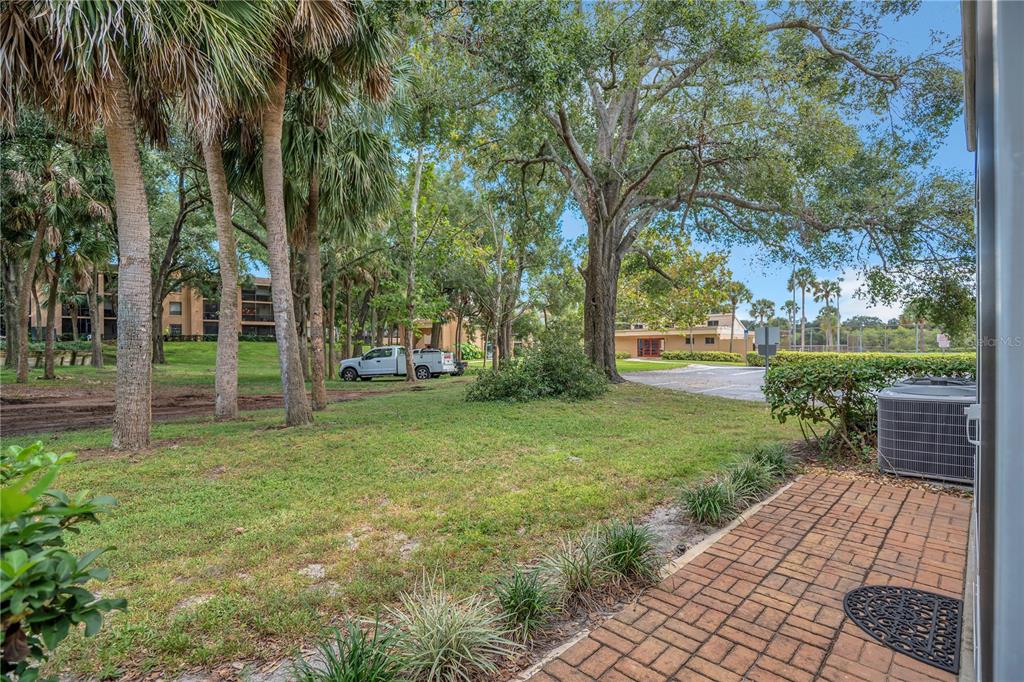 550 Cranes Way, Unit 122 Altamonte Springs, FL 32701 - Photo 18 of 26 a view of a park with large trees