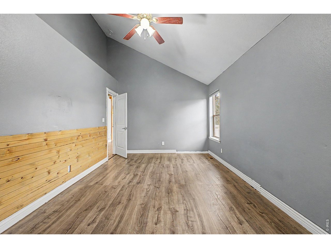 76 Highlands Drive Bailey, CO 80421 - Photo 27 of 49 a view of an empty room and wooden floor