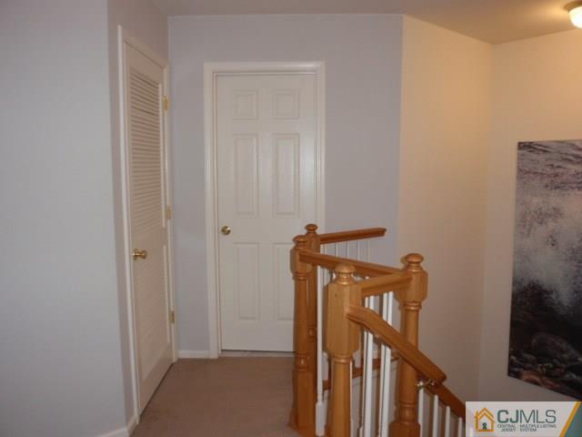 41 Raritan Reach Road, Unit 21 South Amboy, NJ 08879 - Photo 11 of 23 a view of a hallway with a door