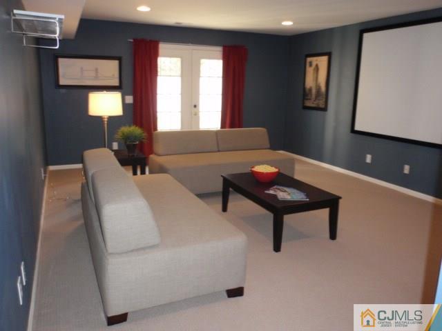 41 Raritan Reach Road, Unit 21 South Amboy, NJ 08879 - Photo 17 of 23 a living room with furniture and a window