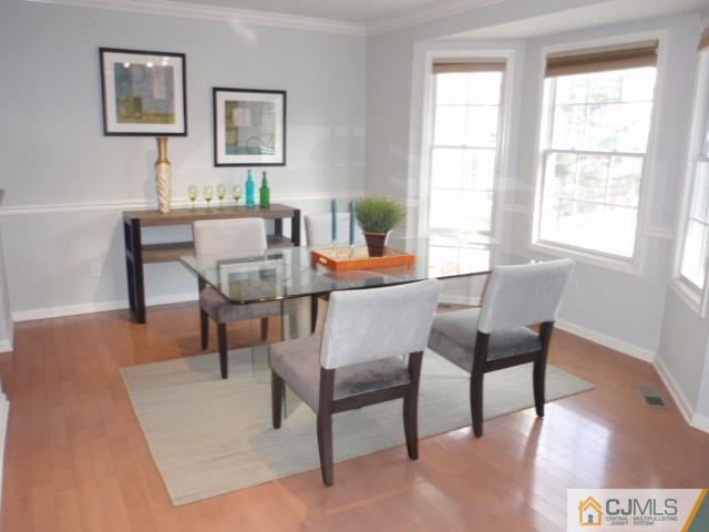 41 Raritan Reach Road, Unit 21 South Amboy, NJ 08879 - Photo 6 of 23 a dining room with furniture and window