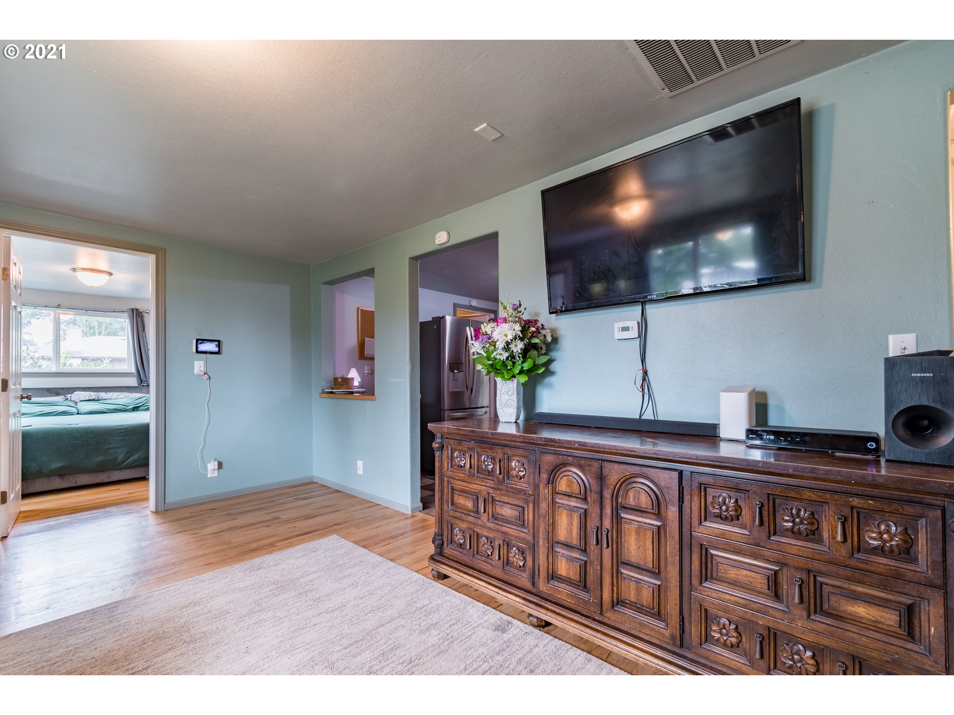 5195 E Street Springfield, OR 97478 - Photo 11 of 30 a living room with furniture and a flat screen tv