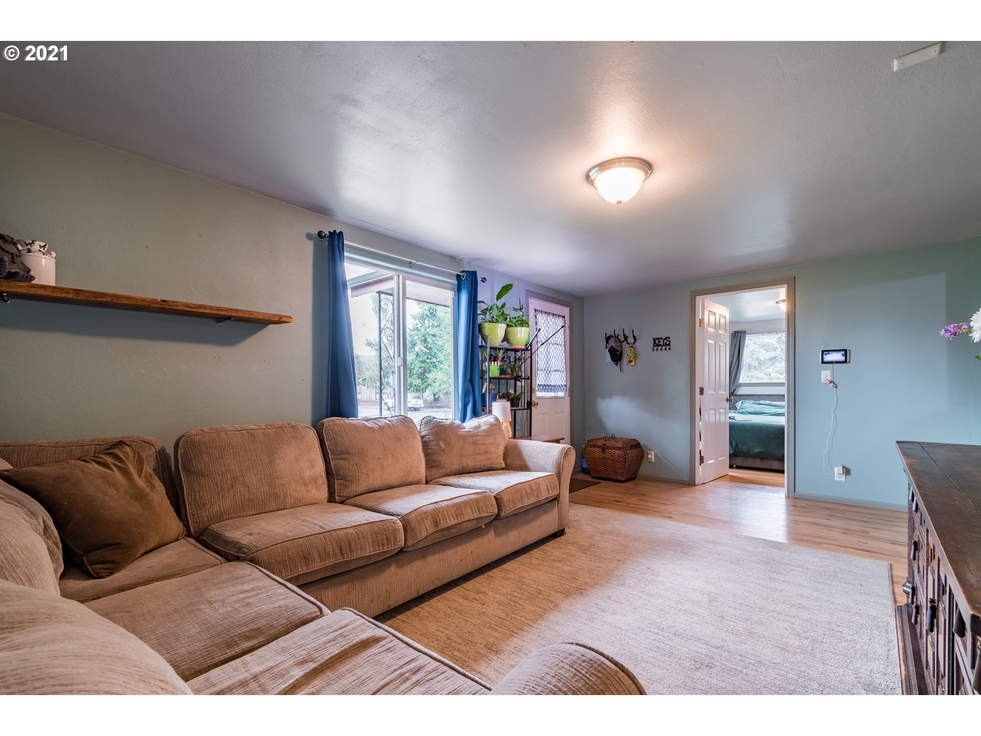 5195 E Street Springfield, OR 97478 - Photo 5 of 30 a living room with furniture and a large window