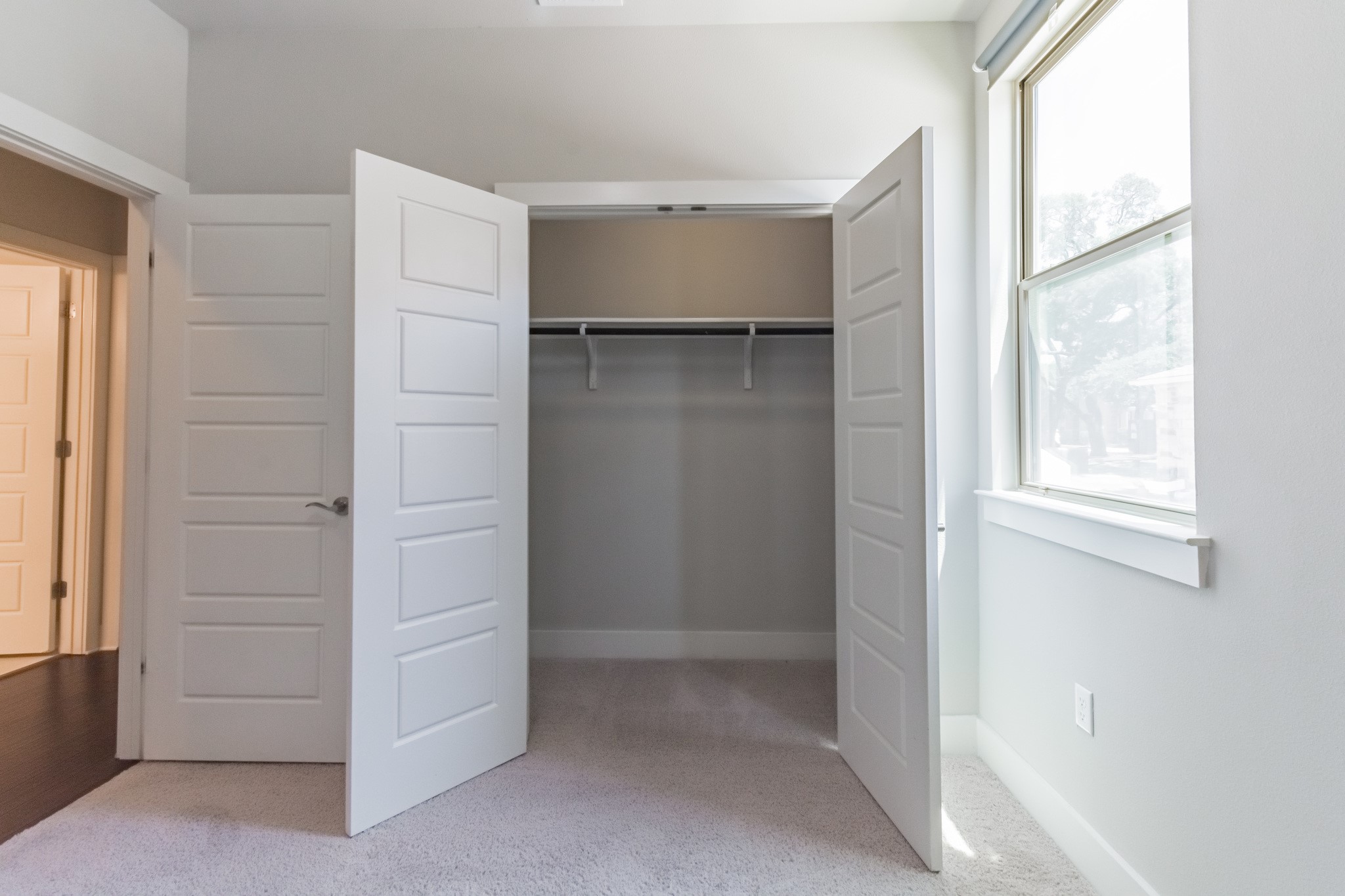 13800 Lyndhurst Street, Unit 221 Austin, TX 78717 - Photo 16 of 40 a view of walk in closet with empty racks