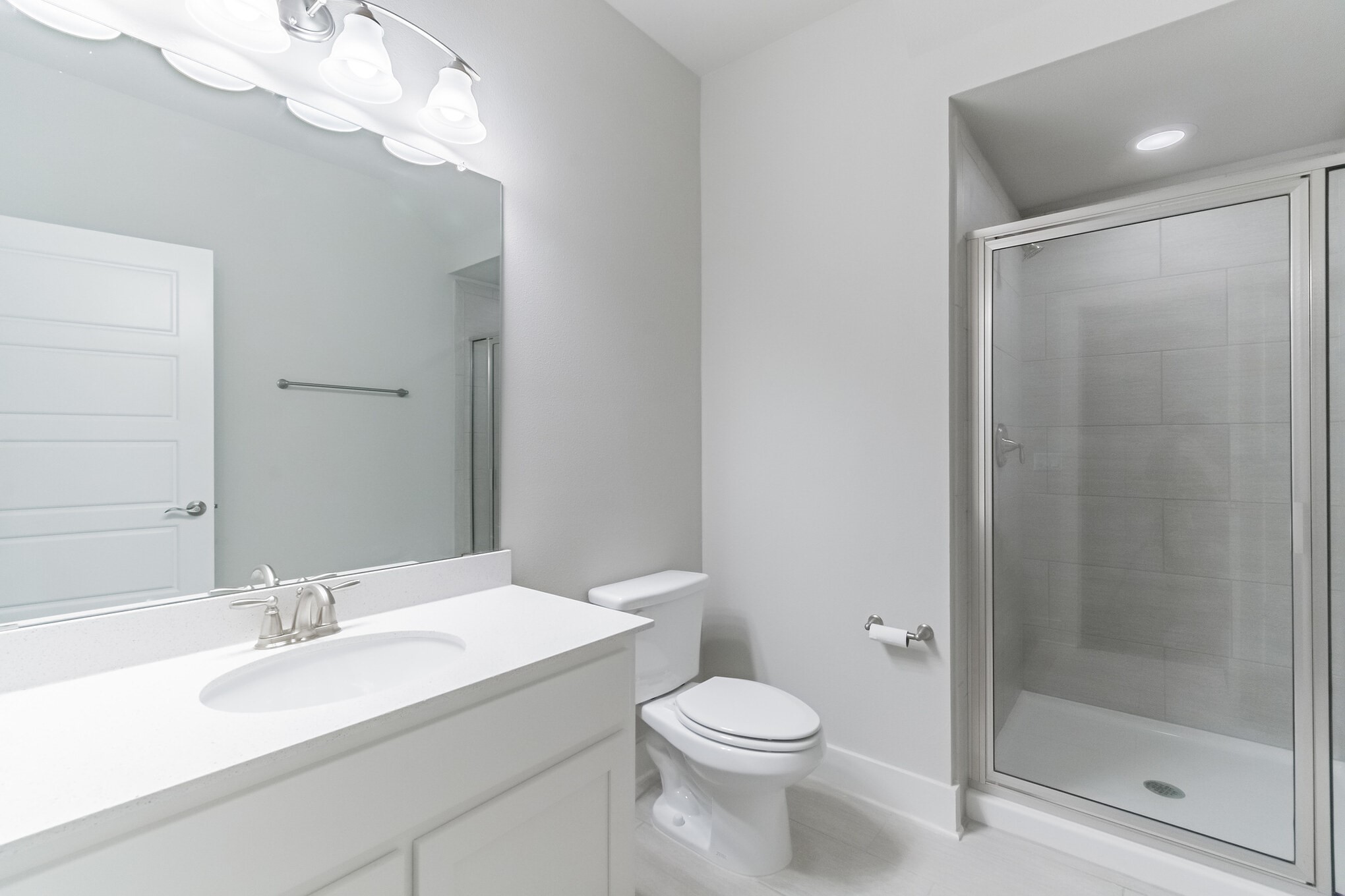 13800 Lyndhurst Street, Unit 221 Austin, TX 78717 - Photo 17 of 40 a bathroom with a sink a toilet and shower