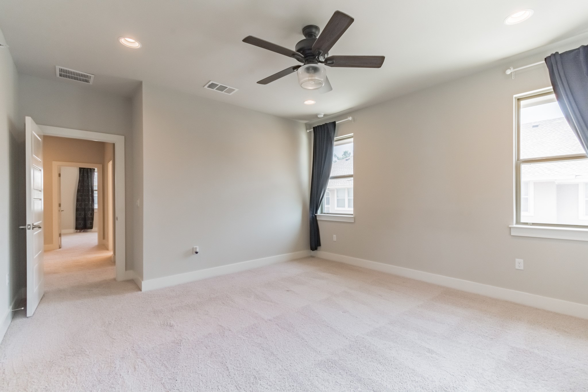 13800 Lyndhurst Street, Unit 221 Austin, TX 78717 - Photo 20 of 40 wooden floor in an empty room with a window