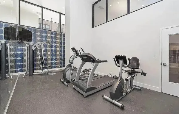a view of a room with gym equipment