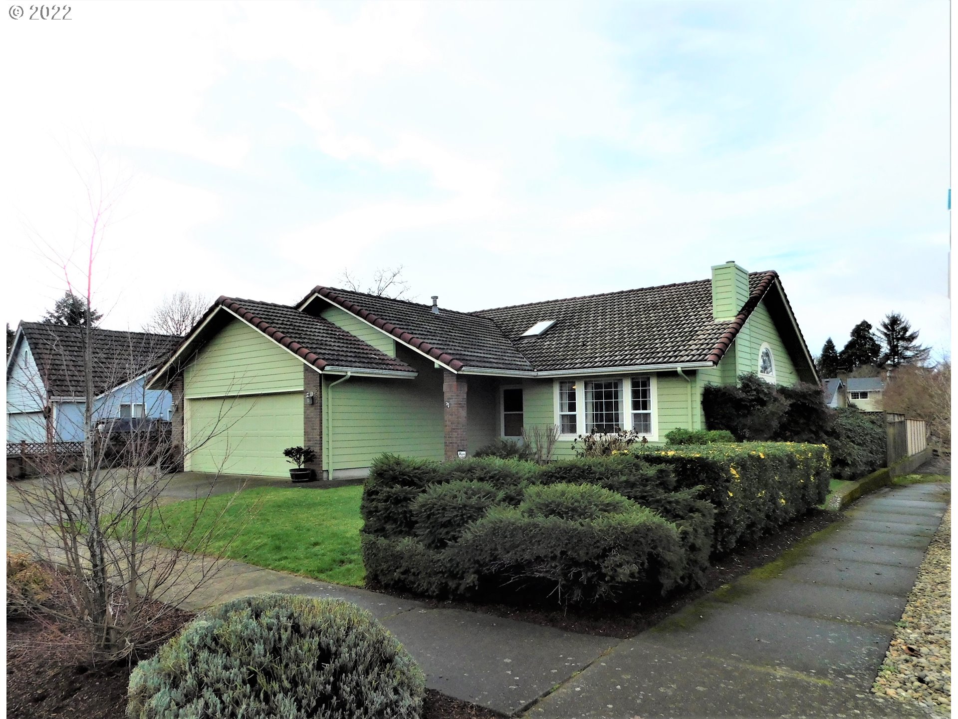 690 Poltava Street Springfield, OR 97477 - Photo 2 of 26 a house view with a garden space