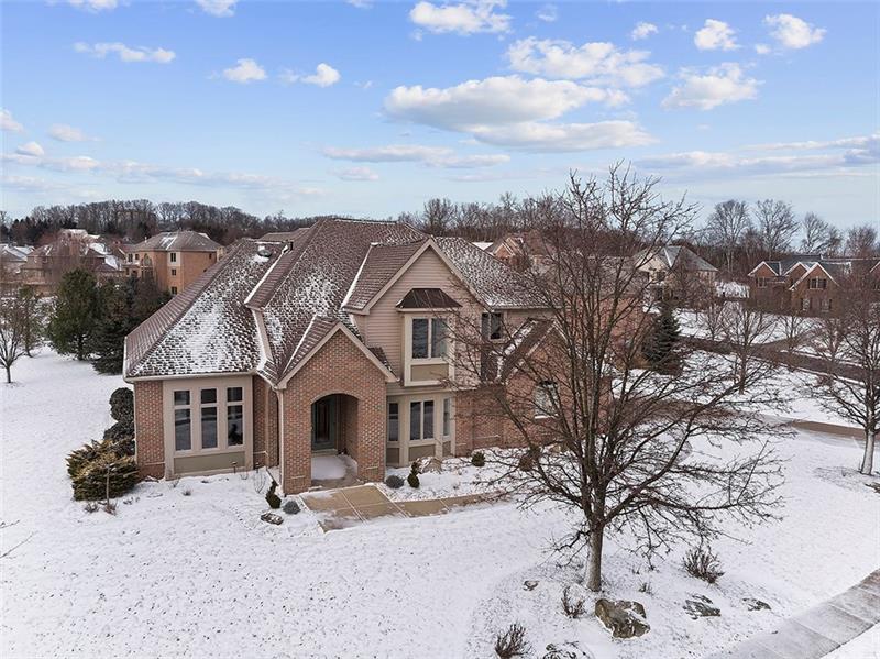 Large open spaces transition beautifully in this two-story brick Provincial providing four bedrooms and 4.5 baths located within the neighborhood of Rabold Fields. 