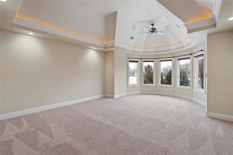 110 Rabold Drive Wexford, PA 15090 - Photo 12 of 25 The master suite resides on the upper level and is detailed with a vaulted tray ceiling with fan, his and her walk-in closets plus a large sitting area (16x16). New carpeting has been installed in the hallway and all the bedrooms.