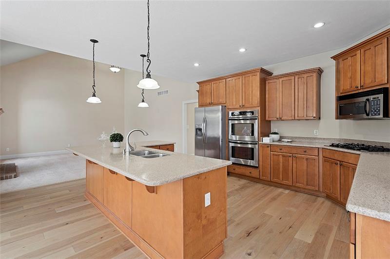 110 Rabold Drive Wexford, PA 15090 - Photo 5 of 25 The kitchen also features beautiful granite counter tops and an abundance of cabinets.