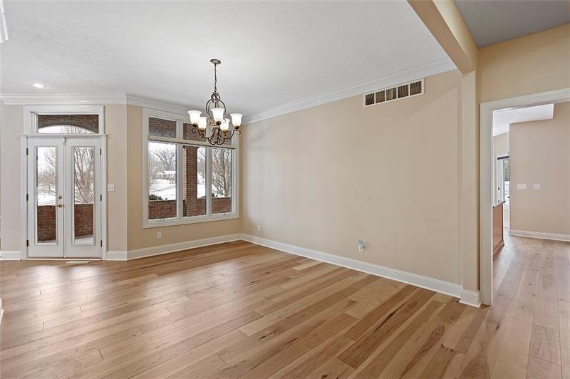 110 Rabold Drive Wexford, PA 15090 - Photo 9 of 25 Entertain in the spacious dining room with crown molding. This area also leads to the covered patio.