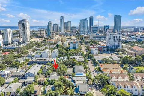 a view of city and a yard