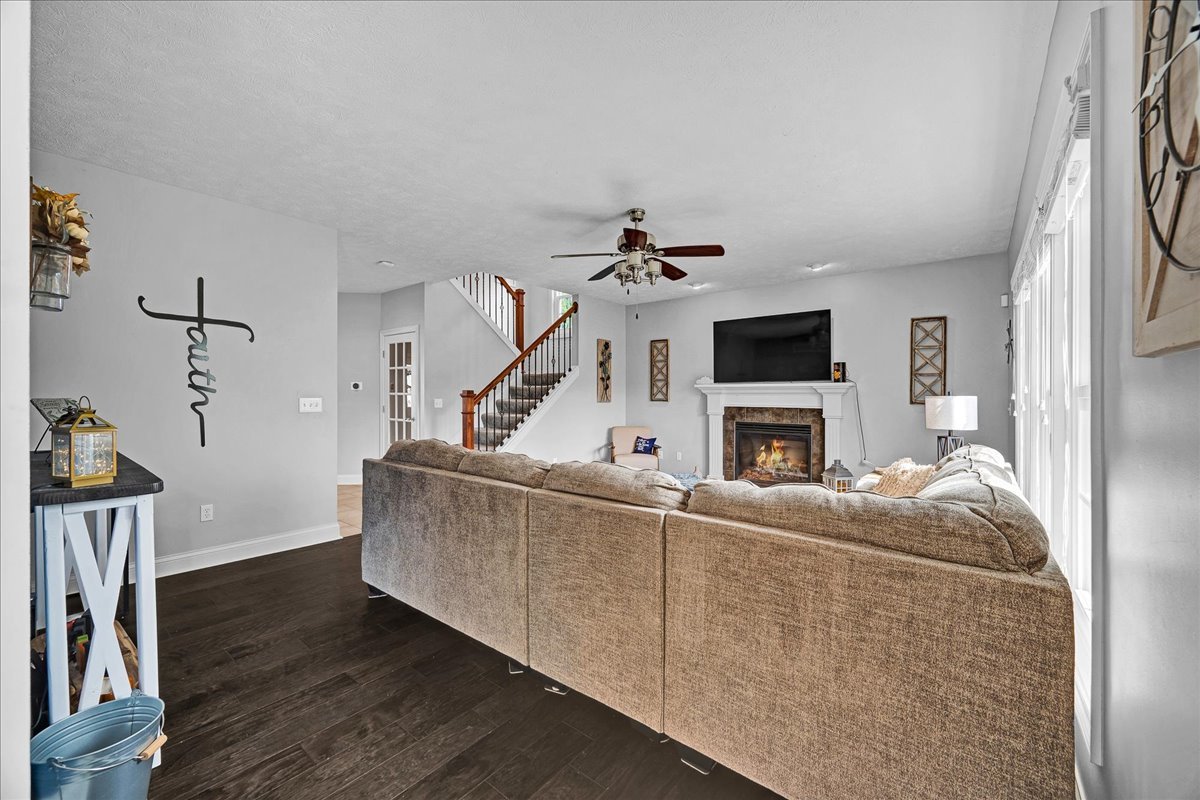 1001 Mugho Court Normal, IL 61761 - Photo 12 of 46 a living room with furniture and a flat screen tv