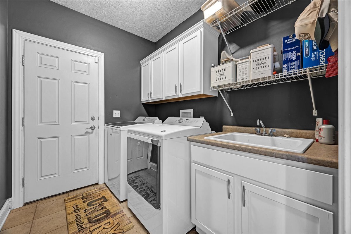 1001 Mugho Court Normal, IL 61761 - Photo 15 of 46 a utility room with dryer and washer