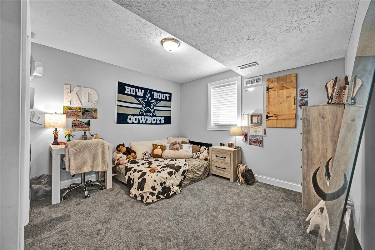 1001 Mugho Court Normal, IL 61761 - Photo 31 of 46 a bedroom with furniture and a large window