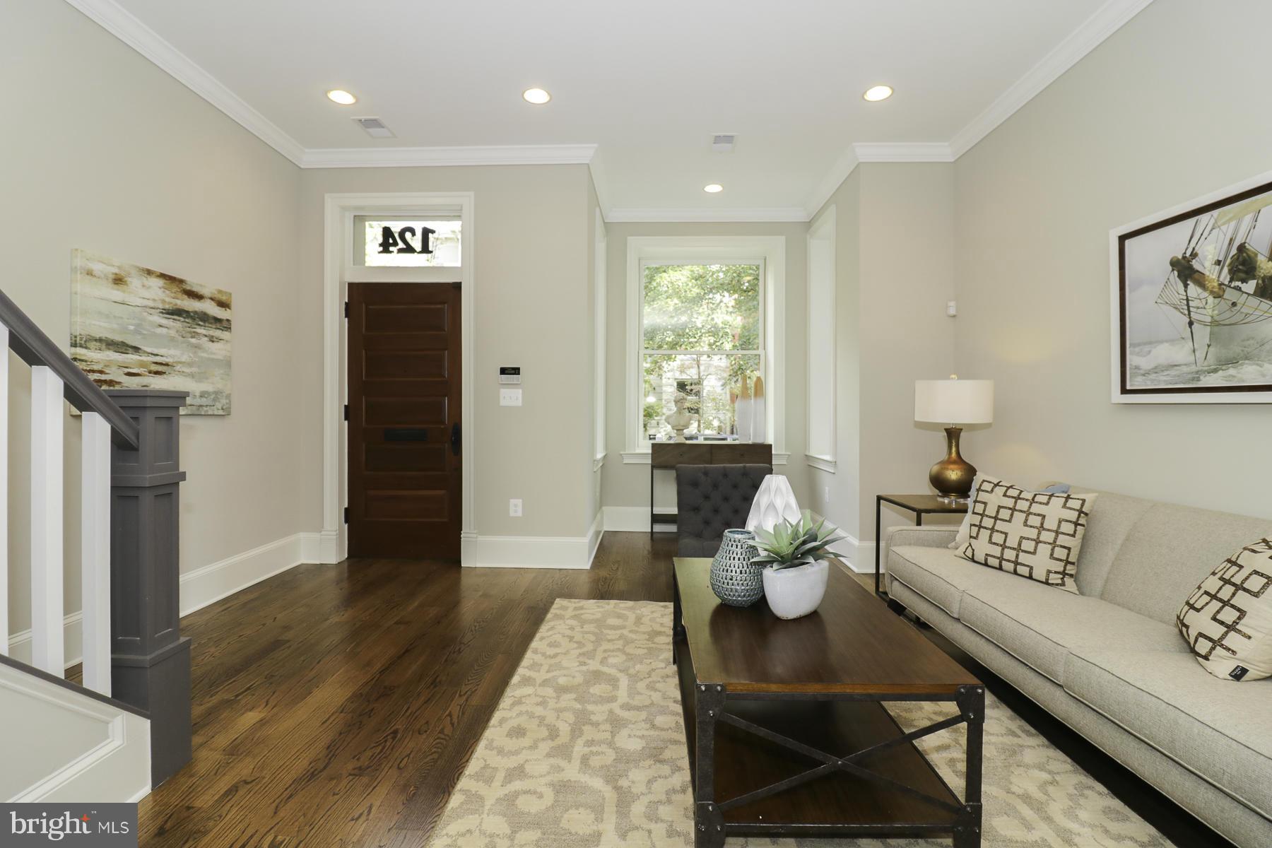124 11th Street Northeast Washington, DC 20002 - Photo 12 of 30 a living room with furniture and wooden floor