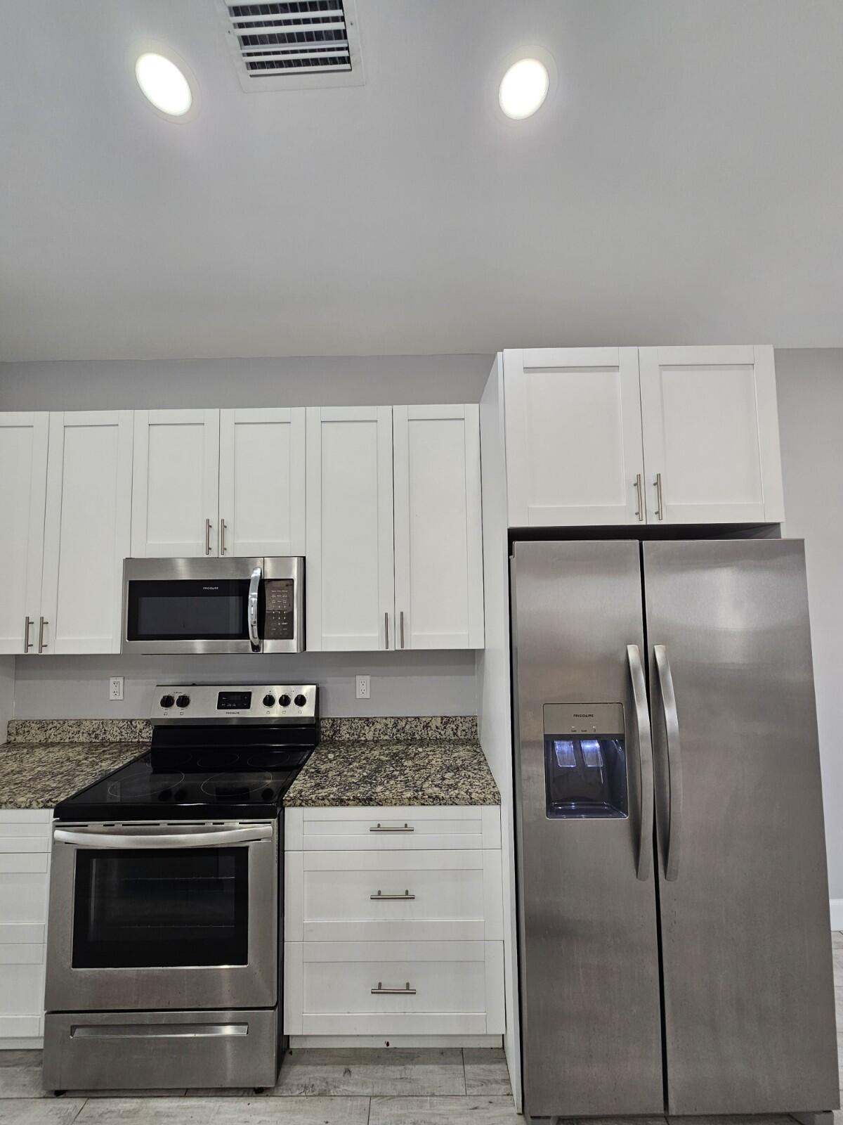 1558 West 26th Court Riviera Beach, FL 33404 - Photo 8 of 34 20250827_111551_copy_1200x1600