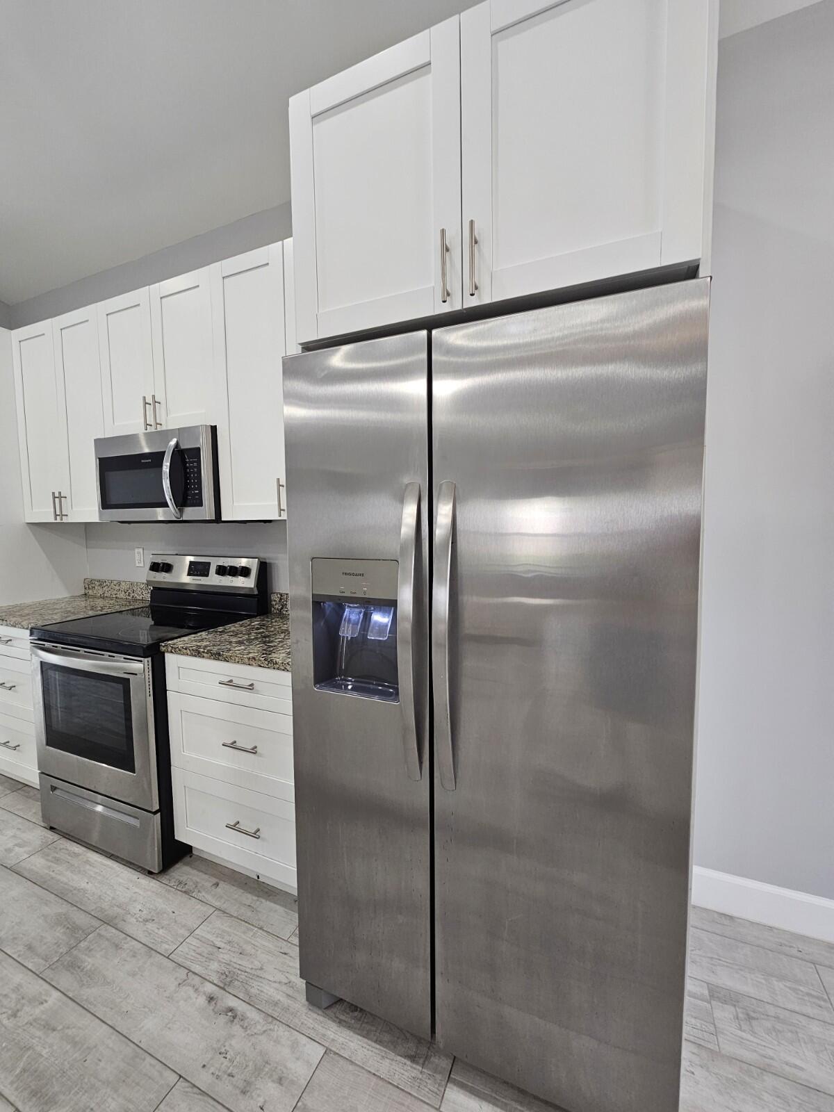 1558 West 26th Court Riviera Beach, FL 33404 - Photo 9 of 34 20250827_111605_copy_1200x1600