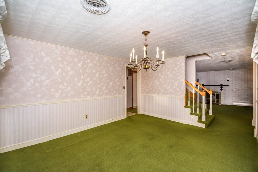 77 Sturges Road Reading, MA 01867 - Photo 5 of 19 a view of a livingroom with furniture