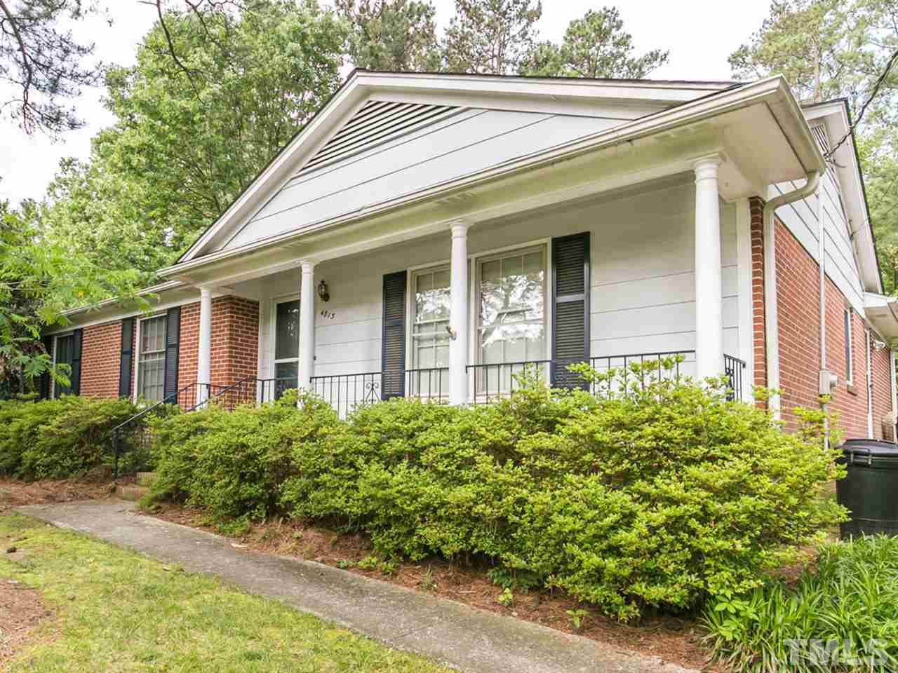 4813 Radcliff Road Raleigh, NC 27609 - Photo 1 of 22 front view of a house with a yard