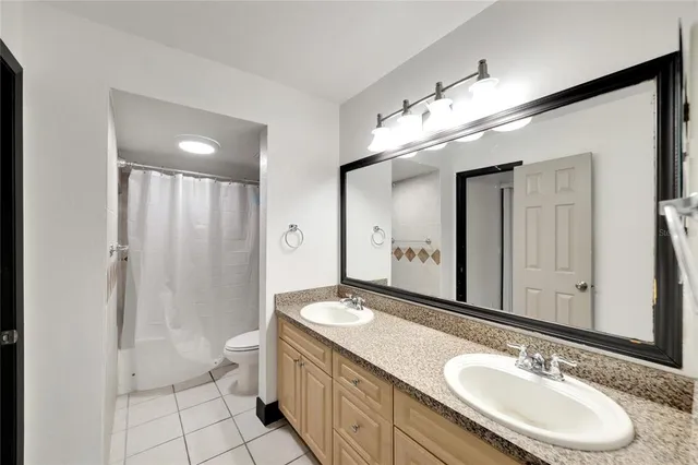 a aerial view of a house with a yard