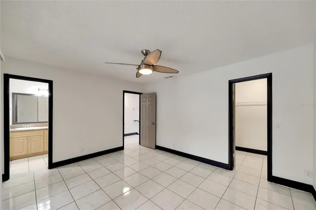 an aerial view of a city with mountains