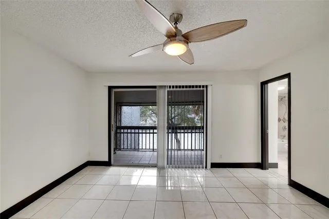 an aerial view of residential houses with outdoor space and river