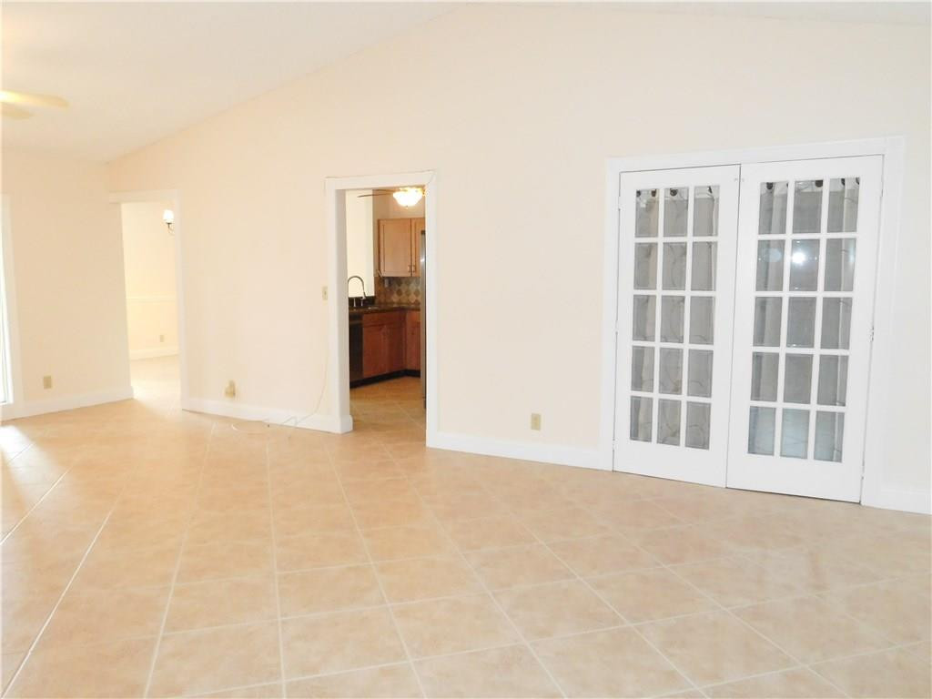 18897 Cloud Lake Circle Boca Raton, FL 33496 - Photo 9 of 23 a view of an empty room with a window