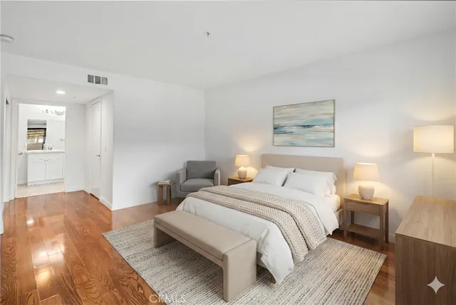 a view of a livingroom with wooden floor