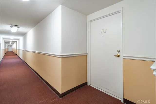 a view of a hallway with entryway