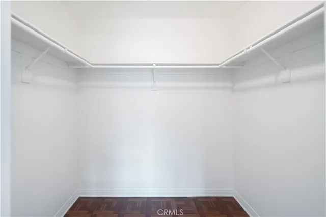 a view of storage and utility room with washer and dryer