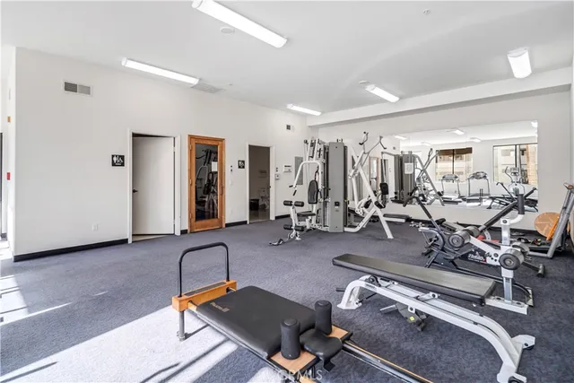 a view of a room with gym equipment