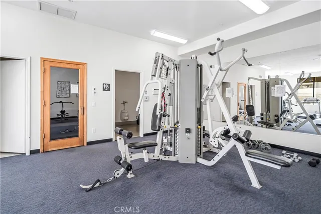 a bathroom with a sink and curtain