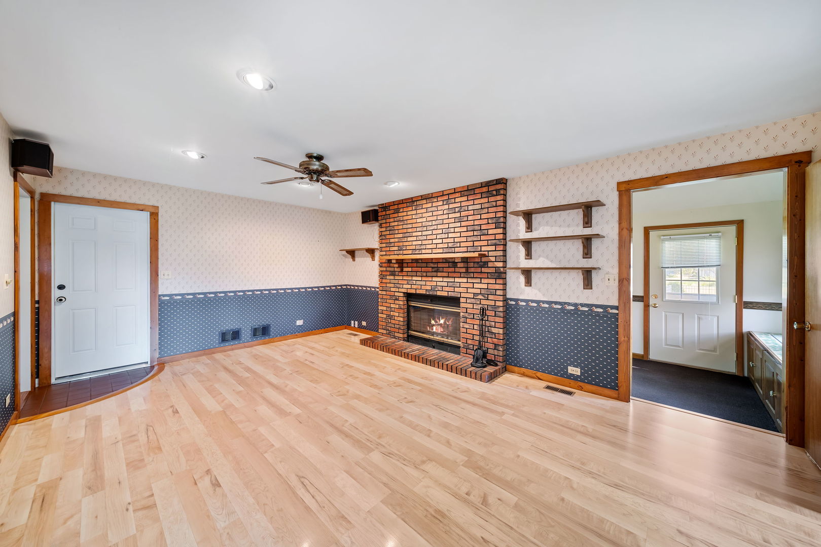 8515 Schmidt Street Spring Grove, IL 60081 - Photo 20 of 43 a room with furniture and a flat screen tv
