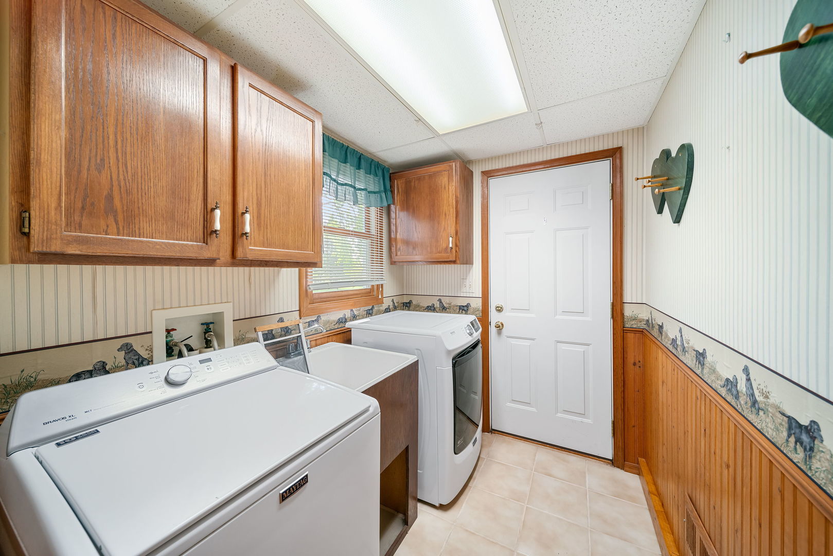 8515 Schmidt Street Spring Grove, IL 60081 - Photo 27 of 43 a utility room with dryer and washer