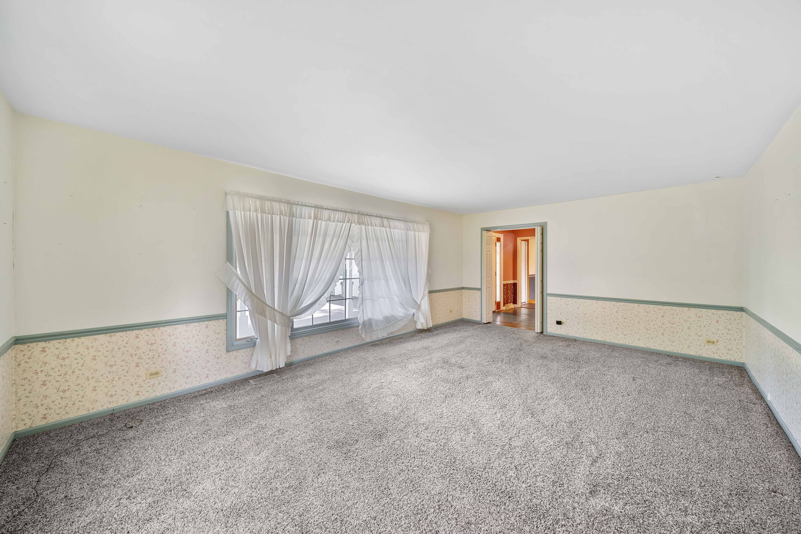 8515 Schmidt Street Spring Grove, IL 60081 - Photo 32 of 43 an empty room with a empty space and windows