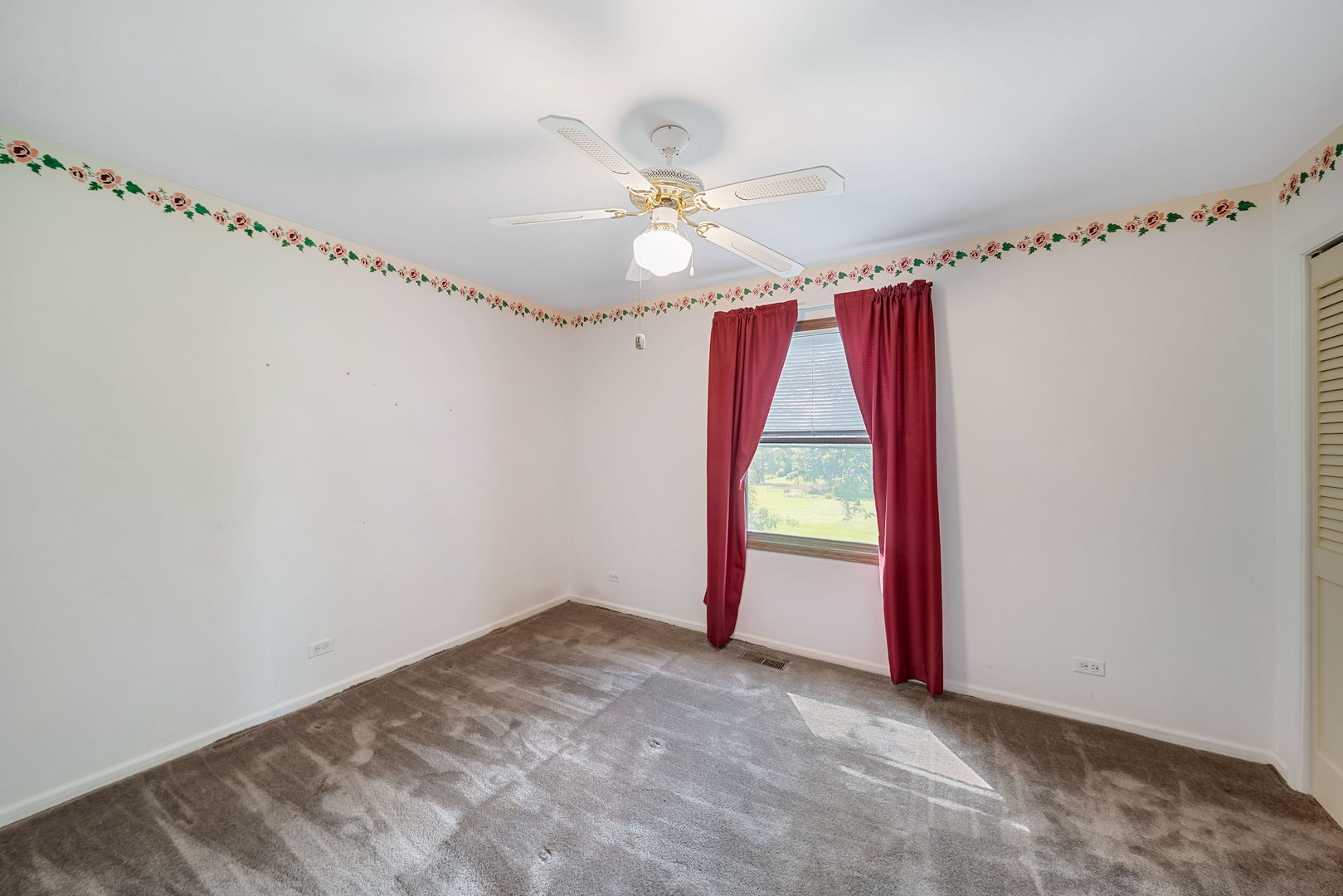 8515 Schmidt Street Spring Grove, IL 60081 - Photo 39 of 43 a view of an empty room with a window