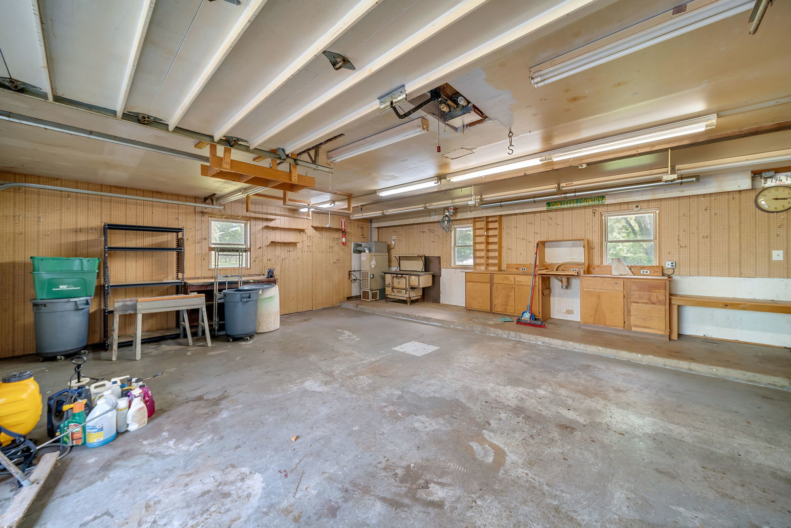 8515 Schmidt Street Spring Grove, IL 60081 - Photo 42 of 43 a view of a garage with table and chairs